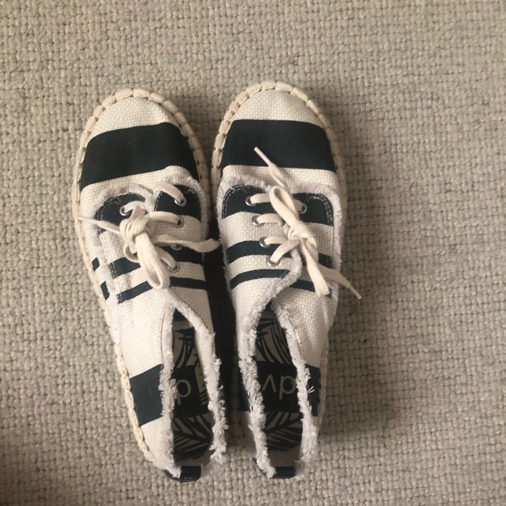 Striped cream and black shoes